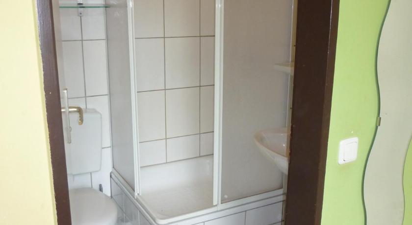 Image of Quadruple Room with Private Bathroom 9