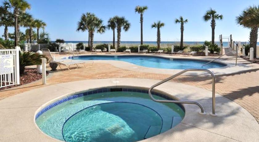 a swimming pool with a pool table and chairs, Destin Towers in Destin (FL)