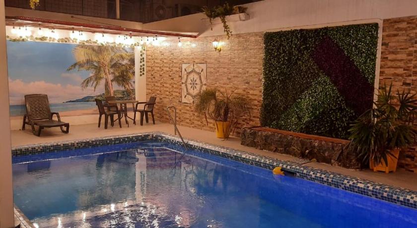 Hostal Perla Real Inn photo