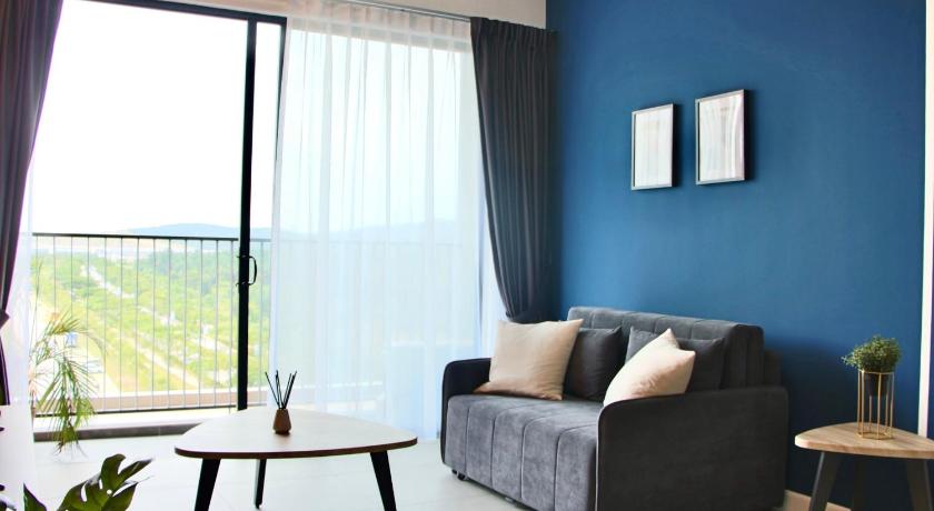 a living room filled with furniture and a window, Bell Suites @ Sunsuria City in Kuala Lumpur