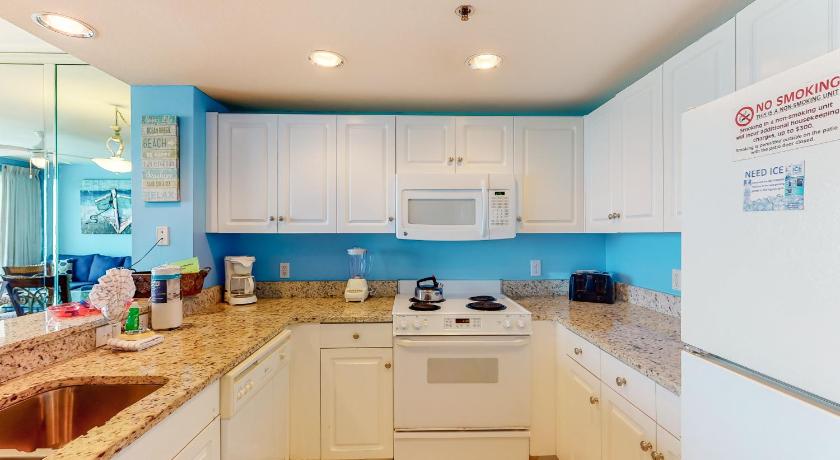 a kitchen with white cabinets and white appliances, Sterling Shores 510 Destin (Condo) in Destin (FL)