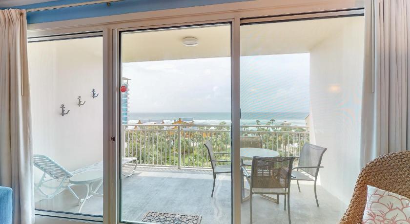a living room with a view of the ocean, Sterling Shores 510 Destin (Condo) in Destin (FL)