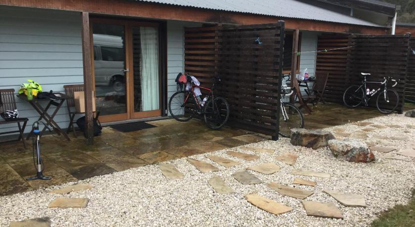 a bike parked in front of a house, Forest Walks Lodge in Deloraine