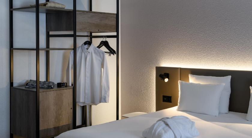 Image of Suite with double bed and sofa, two separate ro oms 10
