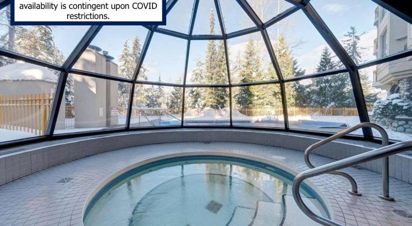 The Modern Whistler Apartment - Ski-in ski-out photo