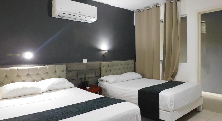 Image of Standard Double Room with Two Double Beds 1