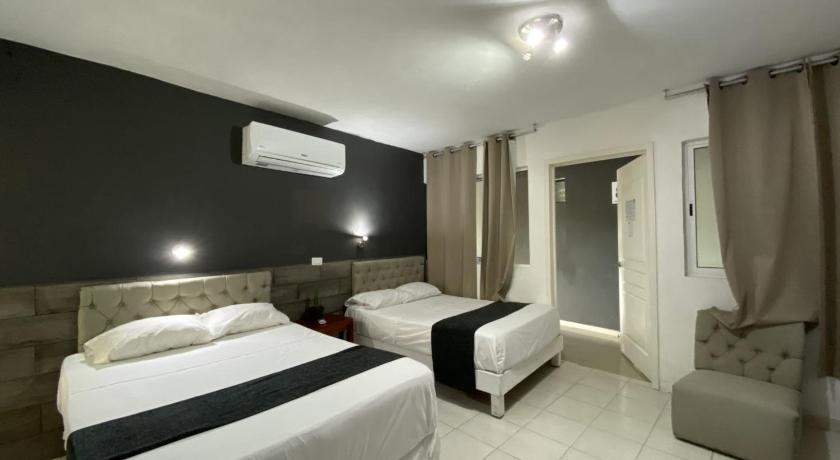 Image of Standard Double Room with Two Double Beds 0