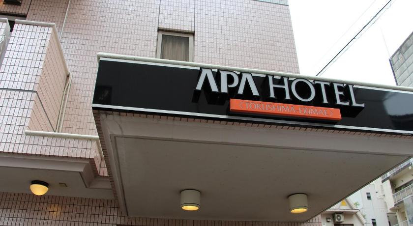 a sign on the side of a building, APA Hotel Tokushima Ekimae in Tokushima