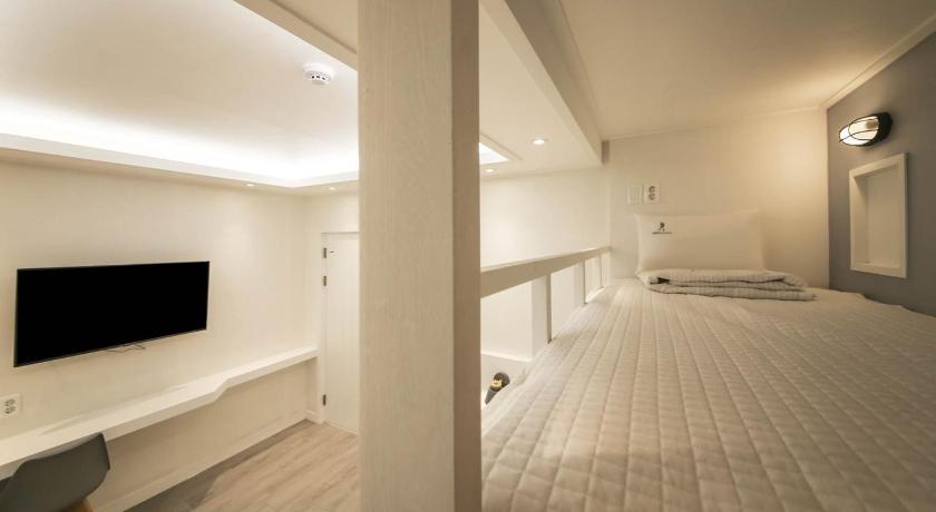 Image of Triple - Room With A Large Bed And A Bunk Bed 8