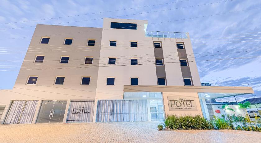 a large building with a large window in front of it, Prime Hotel Ponta Pora in Ponta Pora