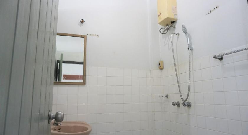 a bathroom with a toilet, sink, and shower, Chomdoi House Hotel (SHA Extra Plus) in Chiang Mai