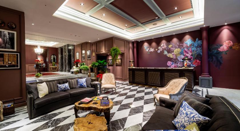a living room filled with furniture and decor, Just Palace in Taipei
