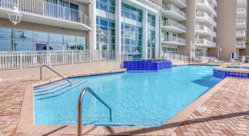 a large swimming pool in a large building, Majestic Sun Condominiums by Wyndham Vacation Rentals in Destin (FL)