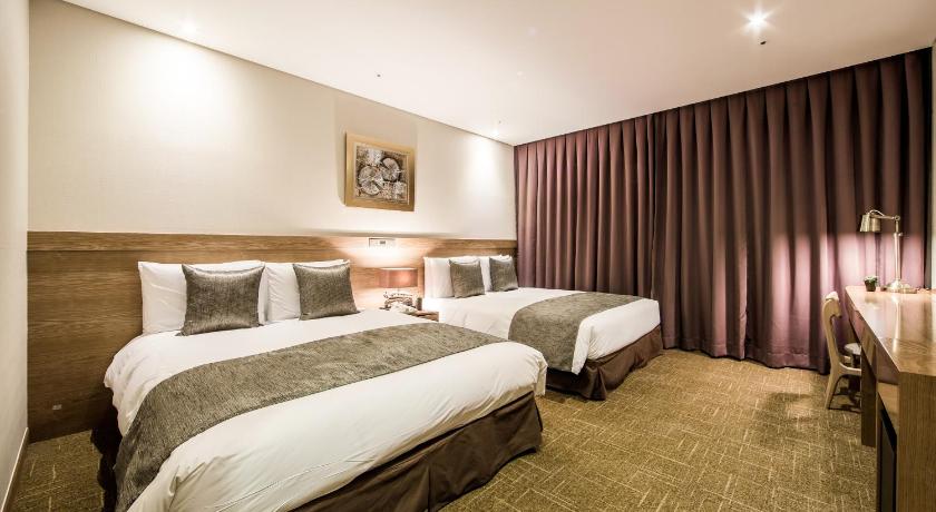 Bild av Familjerum med 2 enkelsängar (Family Twin Room) 1
