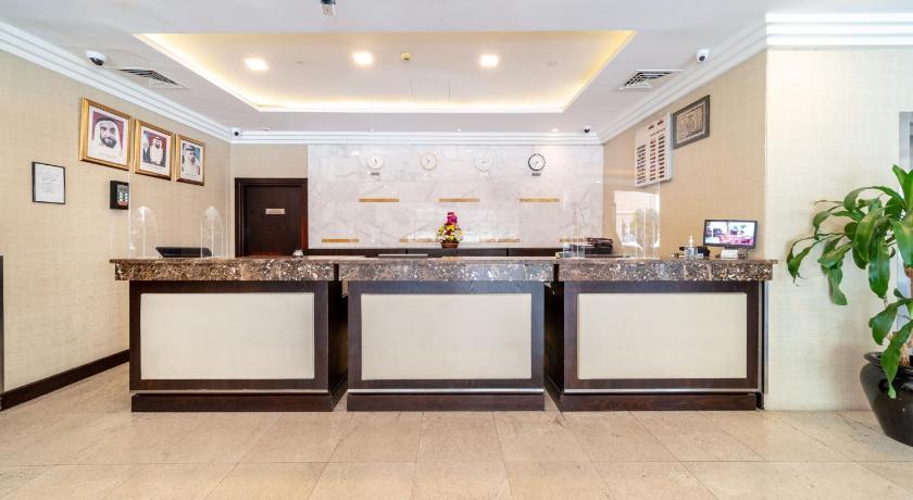 a kitchen with a sink and a counter top, StarMetro Deira Hotel Apartments in Dubai