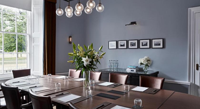 a dining room table with two chairs in front of it, Kimpton Charlotte Square in Edinburgh