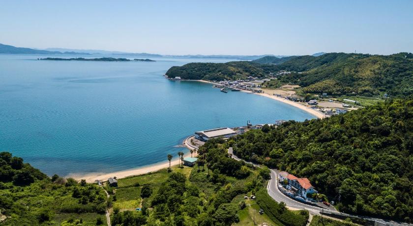 a large body of water surrounded by mountains, Pension KUROSHIOMARU in Setouchi