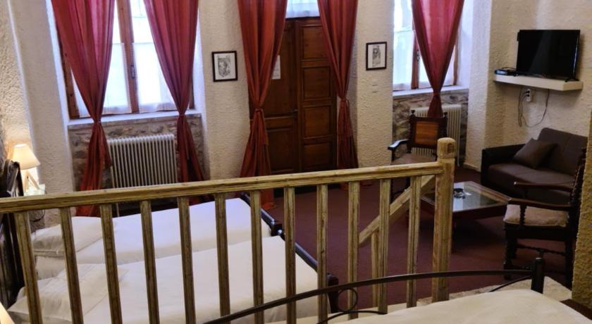 a bedroom with a bed and a window, Pension Maria in Arachova