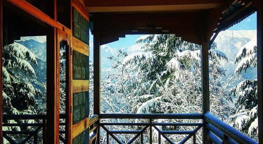 Snow capped Mountain View rooms at Manali photo