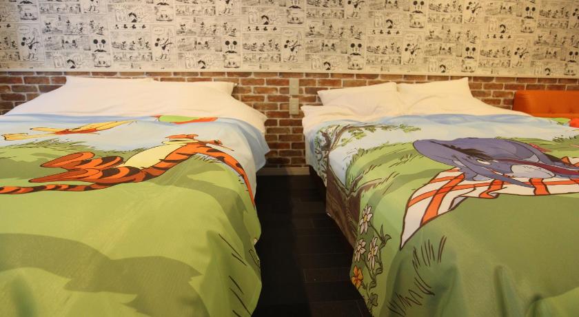 two beds that have different colored pillows on them, Chiba sta 1min J hotel 2020 Open in Chiba