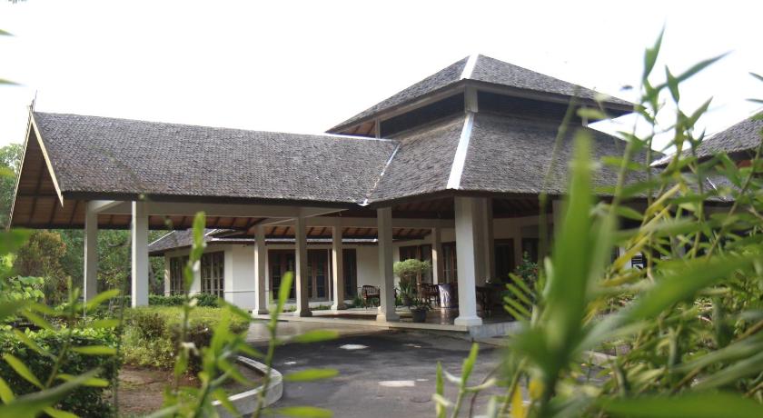 a large stone building with a canopy over it, Rungan Sari Meeting Center & Resort in Palangkaraya