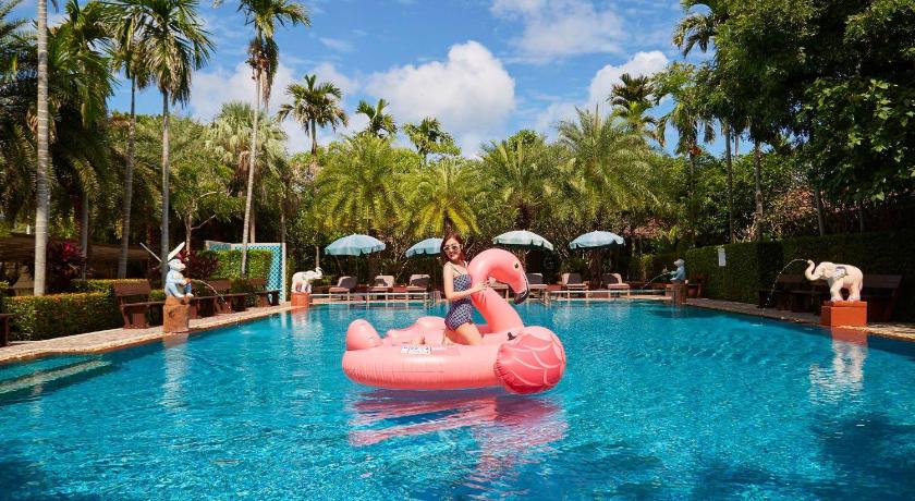 a swimming pool filled with lots of colorful toys, Villa Wanida Garden Resort (SHA Extra Plus) in Pattaya