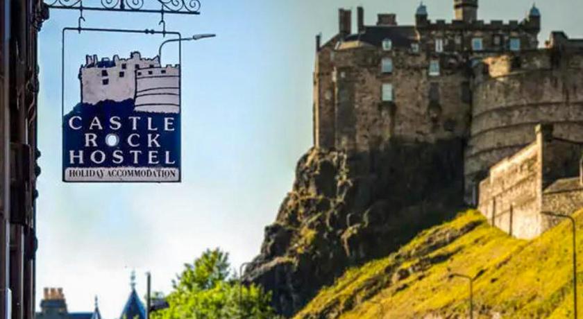 a stone building with a sign on it, Castle Rock Hostel- Adult Only in Edinburgh