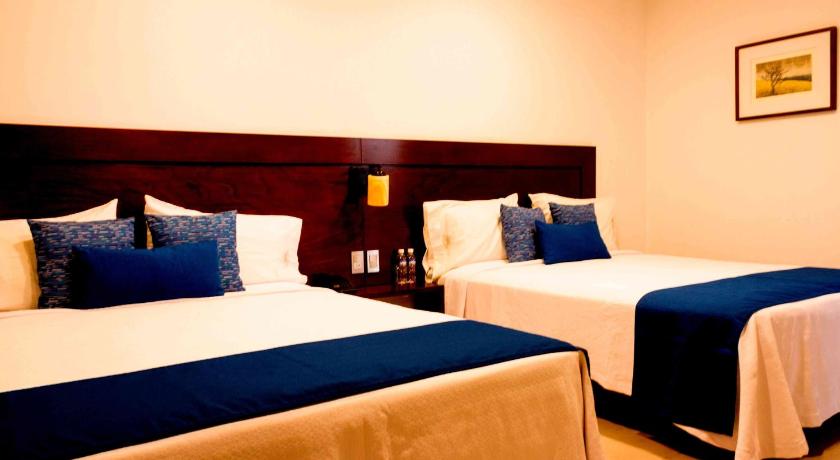 Image of Deluxe Queen Room with Two Queen Beds 0