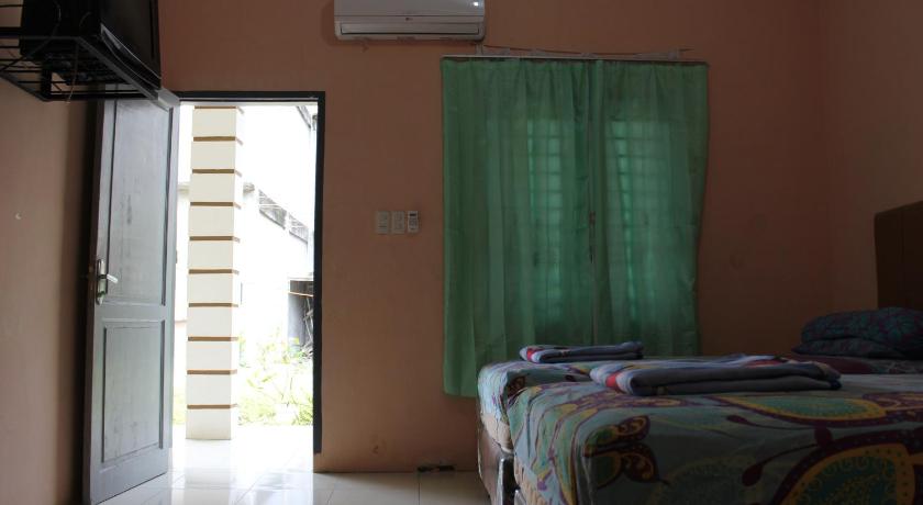 Penginapan Transit Tomato - image 6