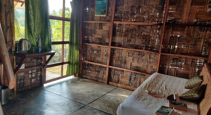 a room with a bed and a window, Emerald Gecko Resort-Neil Island in Andaman and Nicobar Islands