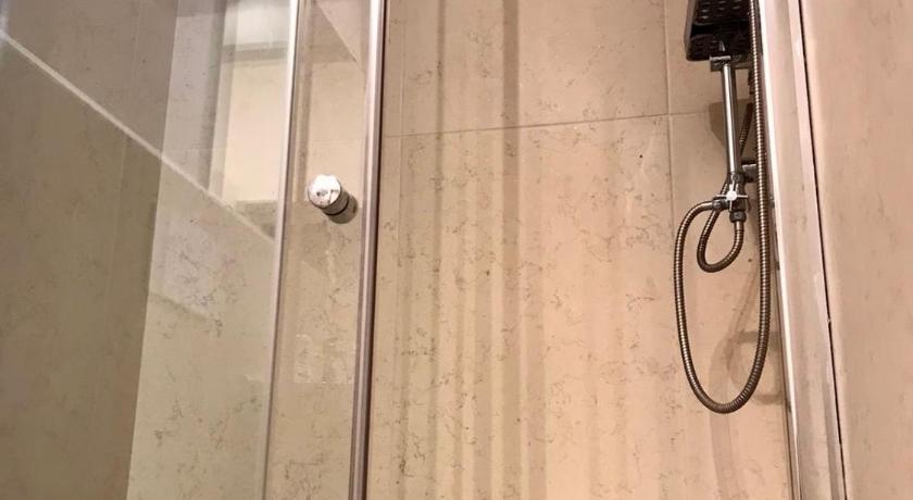 Image of Quadruple Room with Private Bathroom 11