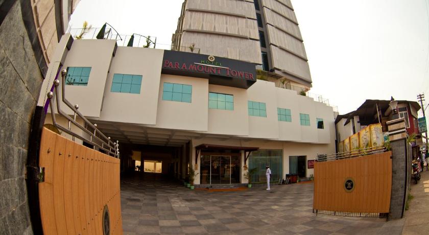 a large building with a lot of windows, Hotel Paramount Tower in Kozhikode / Calicut