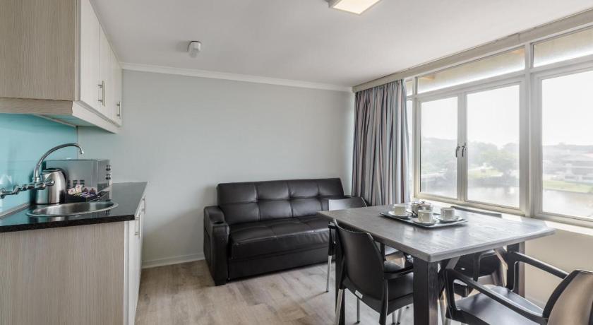 Image of Deluxe Quadruple Room with Sea View 1