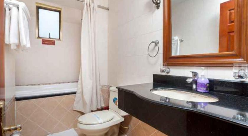 a bathroom with a toilet, sink, and bathtub, Mai Anh Hotel in Ho Chi Minh City