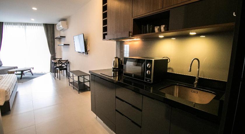 라용 Escape Condominiums Beachfront Suites - Mae Phim 5성급 게스트하우스 로비