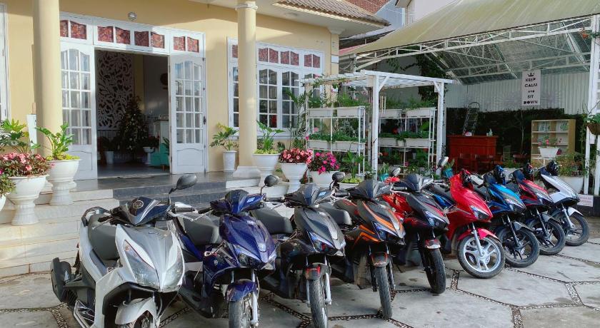 motorcycles parked in front of a building, Dalat Hills Hotel in Dalat