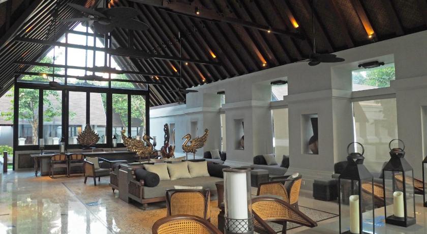 a dining room filled with tables and chairs, Novotel Bogor Golf Resort and Convention Center in Bogor
