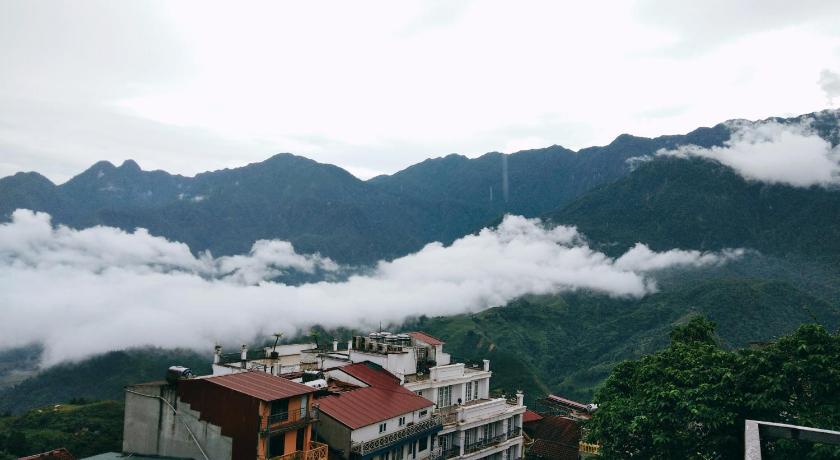 a mountain range with mountains, Nguyen Dang Guesthouse in Sapa