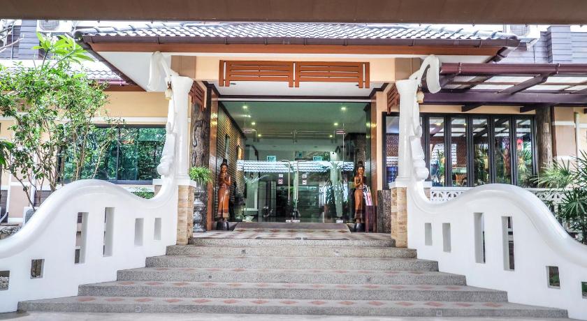 a stairway leading to a building with a balcony, Capital O 727 Be One Resort in Chiang Rai