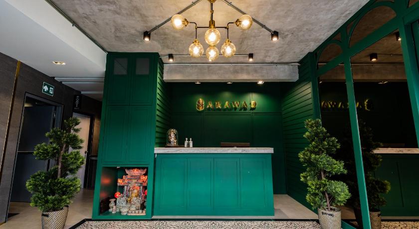 a green room with green walls and a green floor, Narawad Boutique Hotel in Bangkok