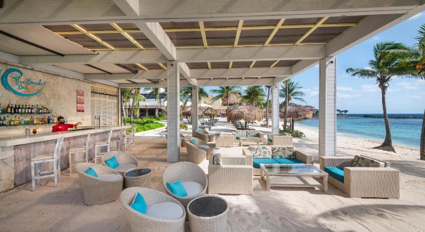 a beach area with chairs, tables and umbrellas, Catalonia Riviera Maya Resort & Spa - All Inclusive in Puerto Aventuras