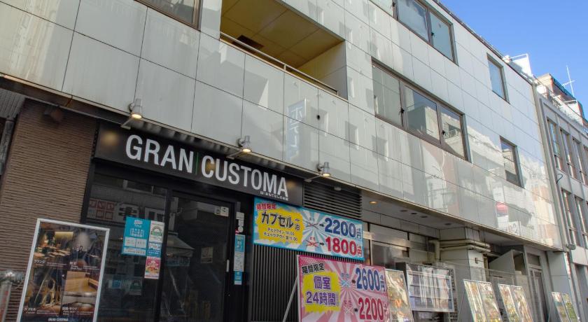 a building with a sign on the side of it, GRAN CUSTOMA UENO in Tokyo