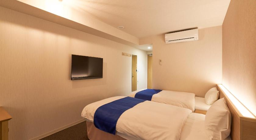 Image of Nonsmoking Economy Twin Room 0