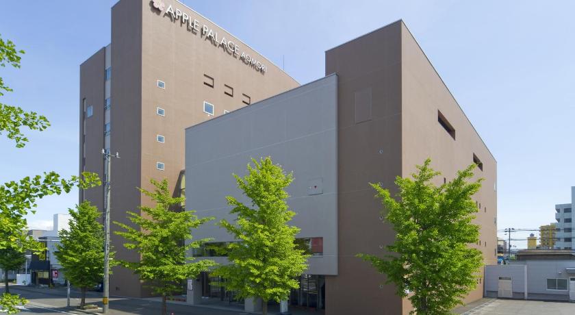 a tall building with a clock on the top of it, Apple Palace Aomori in Aomori