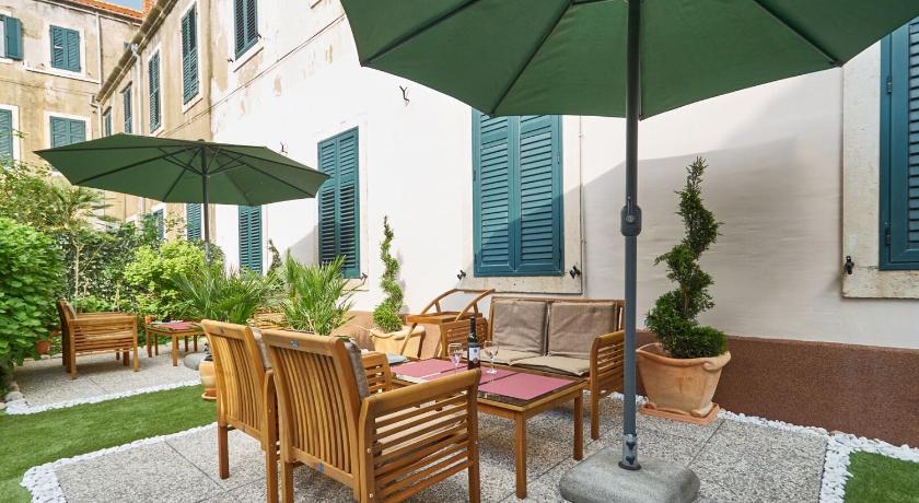 Ragusa with garden next to beach and Old Town photo