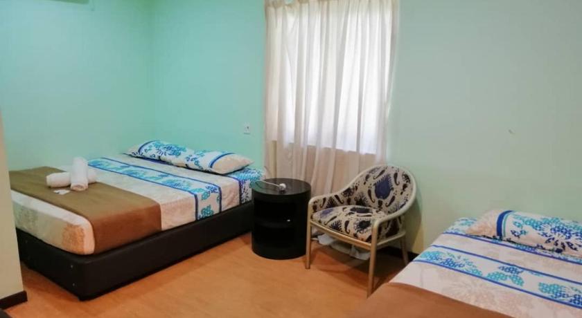 chalet aircond RM50 homestay aircond RM100 KakMah pantai guest house photo