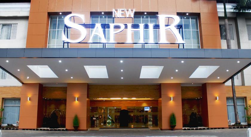 a large building with a sign on the side of it, Hotel New Saphir Yogyakarta in Yogyakarta