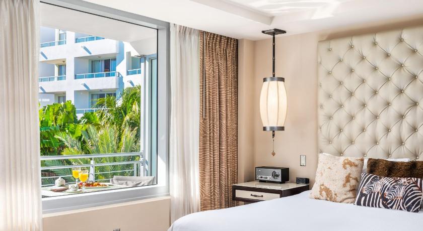 Immagine di Suite Cabana Bordo Piscina (Poolside Cabana Suite) 11