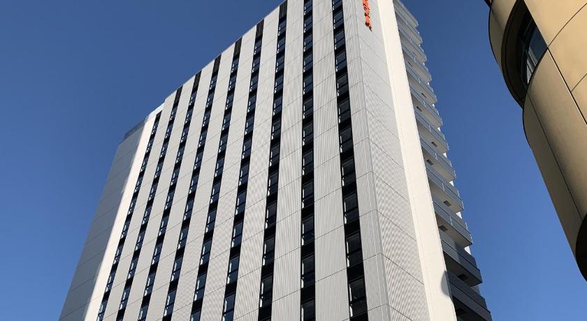 a large building with a large clock on it's side, Hotel Forza Nagoya Sakae in Nagoya