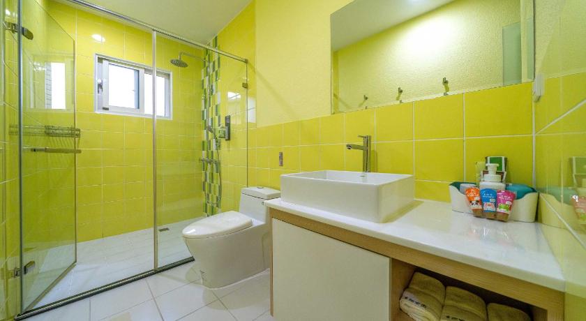 a bathroom with a shower, sink, and tub, Playful Paradise in Yilan
